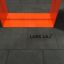 Rubber Tiles 110 by Lars Laj, black tiles under orange structure