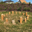 Wooden stepping posts arranged in a circle, Cape Code playground equipment.