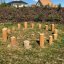 Wooden stepping posts arranged in a circle, Cape Code playground equipment.