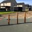 Wooden playground equipment from Madagascar (5 pcs set) in a residential area.