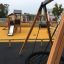 Knight's Castle Nature playhouse with slide in a playground