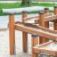 Wooden play structure with sand and water elements called Sand & Water Play Nature.
