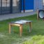 Sand & Water Play Table Nature in grassy outdoor area