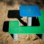 Square bench and table for playground in the sand.