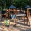 Playground structure Mastodon castle with slide in a park.