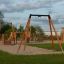 Medium Cableway with platform playground equipment made of wood and metal on a sandy surface.