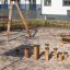 Wooden Jumping Pegs in a School Playground