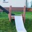 Outdoor playground slide, Hill Slide h150, in a backyard.
