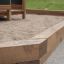 Oak Beam Section (running meter) used as sandbox edging in a playground