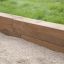 Oak Beam Section (running meter) used as garden border.