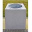 Concrete Vega bin in an outdoor park setting.