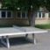 Concrete table tennis, free-standing table in outdoor setting.