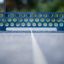 In-ground concrete table tennis table close-up.