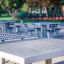 Concrete table tennis, in-ground, outdoor setting.