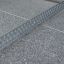 Concrete table tennis, in-ground with perforated metal net.
