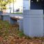 Outdoor concrete and wooden benches Brno in a park.