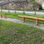 Wooden balance beam and stepping stumps for outdoor playground