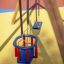 Swing Frame (double swing) in playground with blue seat and child safety chair.
