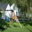 Children playing on Swing Frame (double swing) in a garden
