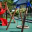 Swing Frame (single swing, wide) in a playground setting