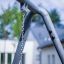 A close-up view of the Swing Metal Frame in a garden.