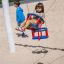 Child sitting on a Swing seat: Baby seat at a playground