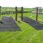Swing seat: Flexi seat on a grassy playground.