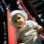 Child sliding down Lemur single slide.