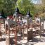 Windsor castle with slide, large outdoor playground structure with towers and climbing elements.