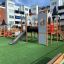 Camelot castle with slide on a playground.