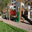 Playground structure Camelot castle with slide, outdoor equipment for kids.