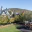 Camelot castle with slide in a scenic park setting