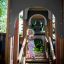 Child playing on a Camelot castle with slide.