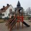 Tintagel playground castle in a park with slides and climbing stairs.