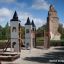 Tintagel playground castle in a park with old brick tower in the background