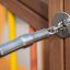 Close-up of a detail from the Challenger- Aztec wooden playhouse showing a strong metallic connectio