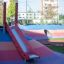 Hill Slide SL120 on a colorful playground hill.