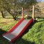 Wide outdoor slide Hill Slide Wide SLW120 in a green park.