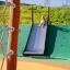 Child sliding down the Hill Slide Wide SLW210 playground equipment.