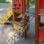 Dixie playhouse with slide and rope ladder