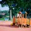 Rubik playhouse with slide on a colorful playground