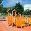 Rubik playhouse with slide on an orange playground.