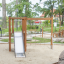 Wooden playground structure with slide and climbing net for children - Grocer's single slide.