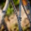 Rope ladder on Grocer's single slide playground equipment.