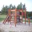 Outdoor playground structure for children with climbing elements, named Kiosk.