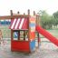 Playground structure Kiosk with red slide and climbing net.