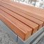 Kyoto park bench with exotic wood slats and sturdy metal frame.