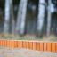 Sand edging pegs (running meter) used to create a neat border in a garden.