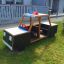Police car play structure for children in the garden.