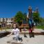 Children playing on the All accessible sandbox.